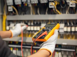 Electrician Testing Distribution Board in Dubai Villa